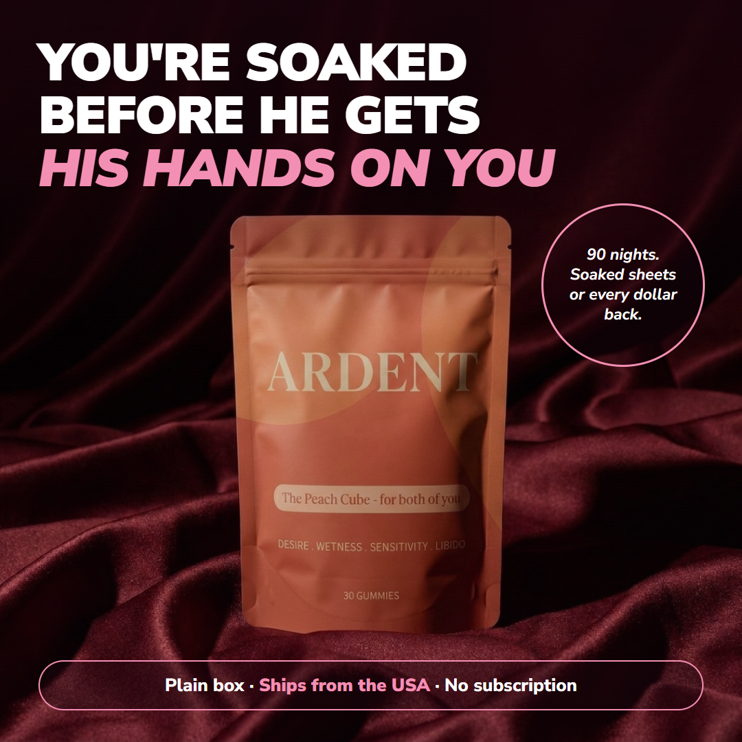 A pouch of Ardent standing on burgundy satin, warm hard light